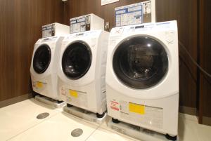 two washing machines are on display in a store at AB Hotel Mikawa Toyota in Toyota