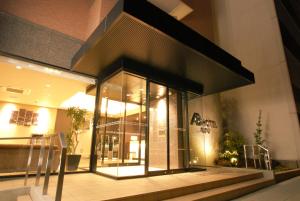 a store front with glass doors in a building at AB Hotel Gifu in Gifu