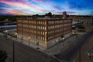 an overhead view of a building on a city street at Stunning Waco Downtown Apartments in Waco
