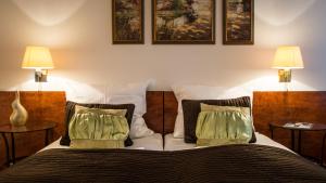 Postel nebo postele na pokoji v ubytování Hotel Löhr + 37 fotografií