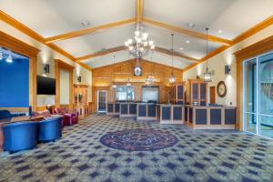 a large room with a kitchen and a living room at Thousand Hills Golf Resort in Branson