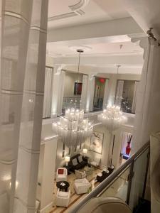 an overhead view of a living room with chandeliers at Inn On Fifth in Naples