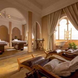 Postel nebo postele na pokoji v ubytování Riad Du Golf Suites - Marrakech
