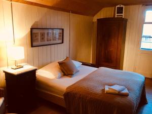 Postel nebo postele na pokoji v ubytování B&B Bären
