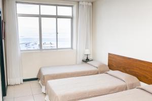 Postel nebo postele na pokoji v ubytování Pousada Colonial Chile