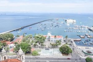 a harbor filled with lots of boats and buildings at Pousada Colonial Chile in Salvador
