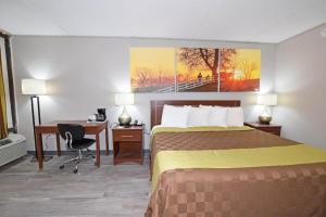 Postel nebo postele na pokoji v ubytování Days Inn by Wyndham Midland