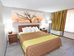Postel nebo postele na pokoji v ubytování Days Inn by Wyndham Midland