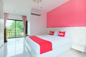 Postel nebo postele na pokoji v ubytování Tina Boutique Resort