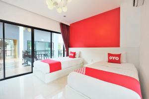 Postel nebo postele na pokoji v ubytování Tina Boutique Resort