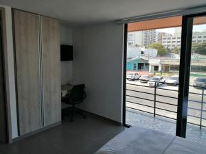 Postel nebo postele na pokoji v ubytování Berilo Deluxe Apartahotel