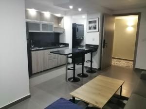 Kuchyň nebo kuchyňský kout v ubytování Berilo Deluxe Apartahotel