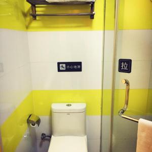 a bathroom with a toilet and a shower at 7Days Inn Guiyang Jinyang Century City Shopping Center in Guiyang