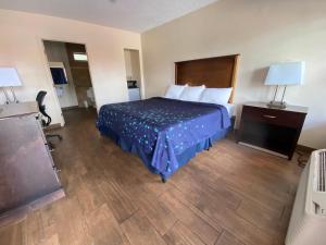 Cama o camas de una habitación en Coral Roc Motel