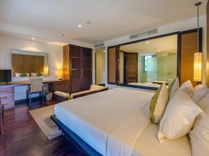 Ruby Nusa Dua Bali客房内的一张或多张床位