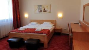 Postel nebo postele na pokoji v ubytování Diana Club Hotel