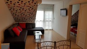 Posezení v ubytování Riadorma Apartman