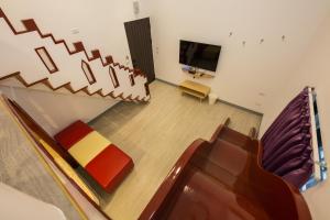 Una televisión o centro de entretenimiento en Xiaoliuqiu 88 Homestay