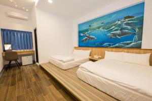 Cama o camas de una habitación en Xiaoliuqiu 88 Homestay