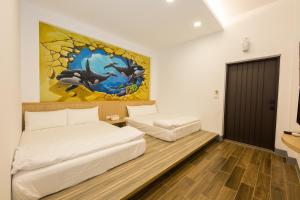 Cama o camas de una habitación en Xiaoliuqiu 88 Homestay