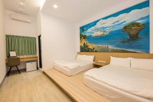 Cama o camas de una habitación en Xiaoliuqiu 88 Homestay