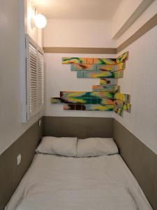 Cama o camas de una habitación en Art Galaktika Hotel