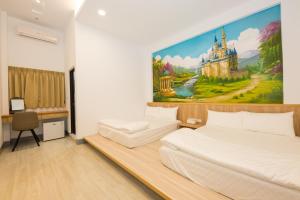 Cama o camas de una habitación en Xiaoliuqiu 88 Homestay