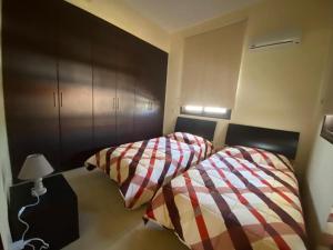 Un pat sau paturi într-o cameră la Villa Orestis Sand Beach
