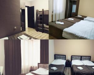 Postel nebo postele na pokoji v ubytování Tradition Hotel