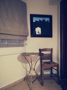 TV a/nebo společenská místnost v ubytování Guesthouse Axieros