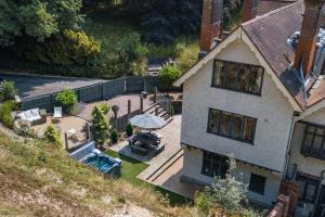 an aerial view of a house with a patio at Hockley House by Bloom Stays in Folkestone