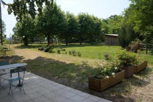 Giardino di A l'orée du bois - Chambres d'hôtes