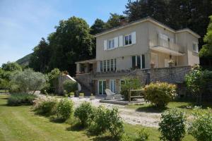 Giardino di A l'orée du bois - Chambres d'hôtes