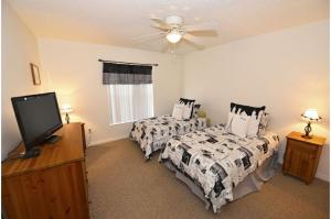 Ένα ή περισσότερα κρεβάτια σε δωμάτιο στο Four-Bedroom Pool Home Davenport +16 φωτογραφίες