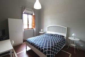 Posteľ alebo postele v izbe v ubytovaní Le Cascine