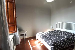 Posteľ alebo postele v izbe v ubytovaní Le Cascine