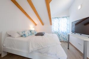 Posteľ alebo postele v izbe v ubytovaní Villa Charm