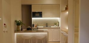 A kitchen or kitchenette at The Boc Suites Még 37 kép