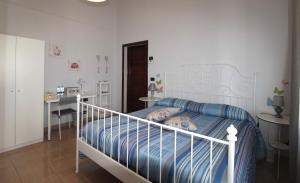 Posteľ alebo postele v izbe v ubytovaní Le Cascine