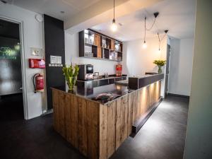 Kuchyň nebo kuchyňský kout v ubytování B&B bij de 3 linden