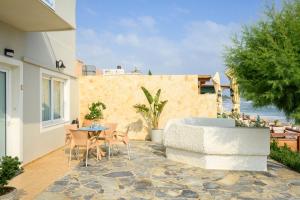 Vonkajšia záhrada v ubytovaní Hermes Beach Front