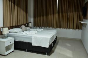 Tangará Hotel 객실 침대