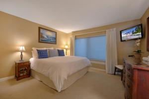 Amelia Island Oceanfront 2 Master Suites客房内的一张或多张床位