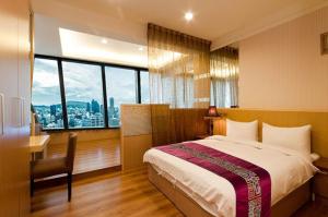 Giường trong phòng chung tại 85 Vacation ApartHotel