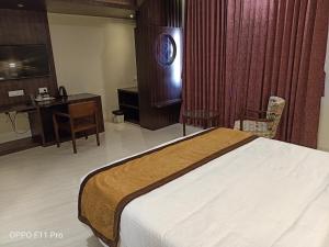 The Hotel Celebration客房内的一张或多张床位