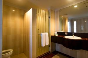 Koupelna v ubytování Champlung Mas Hotel Legian