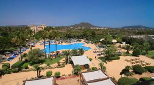 an aerial view of a resort with a pool at Garbi Cala Millor in Cala Millor