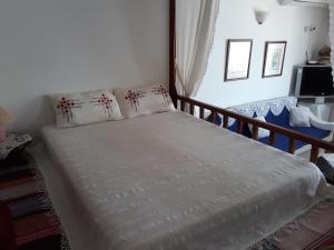 Postel nebo postele na pokoji v ubytování Evelinas Apartement