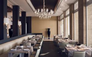 A restaurant or other place to eat at Pelagos Suites Hotel & Spa