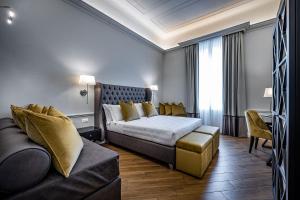 Postel nebo postele na pokoji v ubytování Hotel Ungherese Small Luxury Hotel